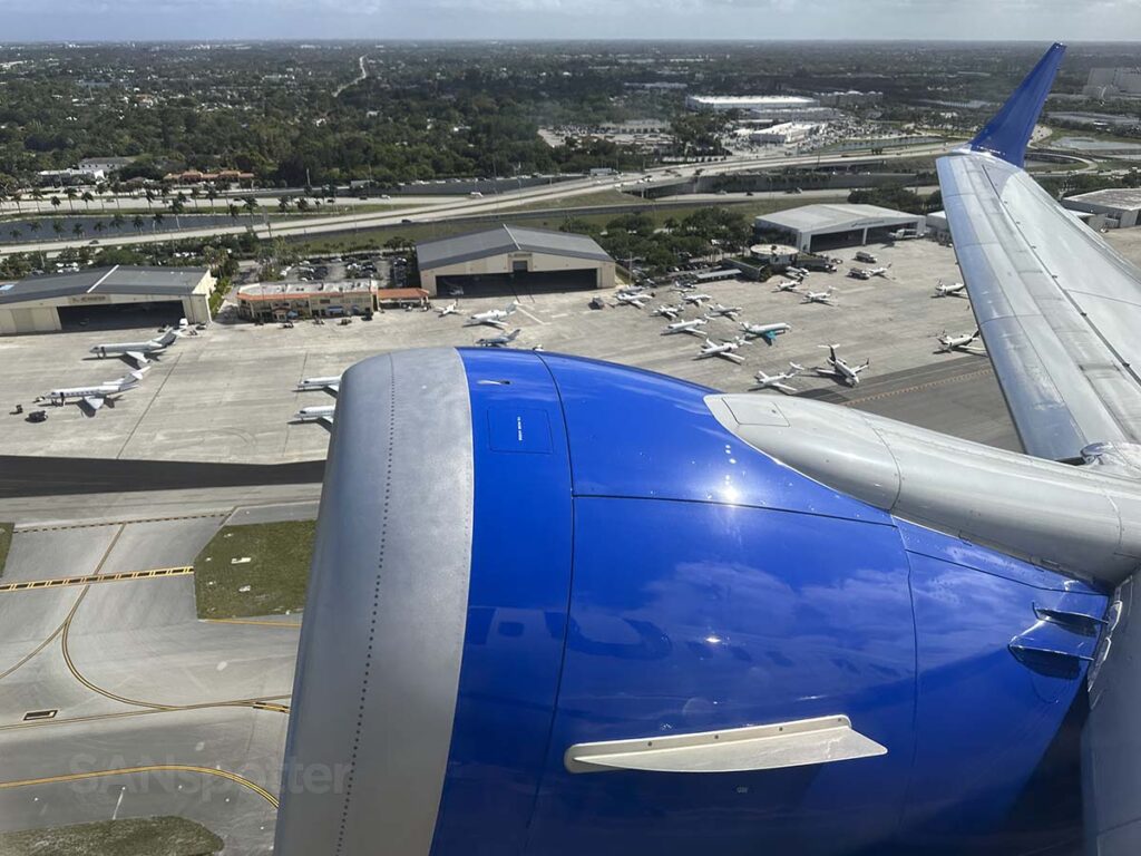 Looking out the window from seat 10F in a United 737 MAX 9 while taking off from runway 10L at PBI