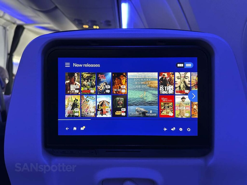 United 737 MAX 9 Economy Plus in-flight entertainment new releases screen showing a grid of options