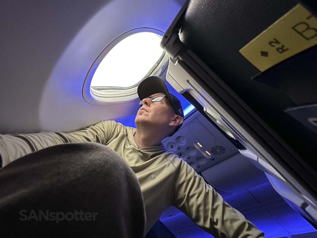 Scott (SANspotter) looking out the window of United 737 MAX 9 Economy Plus while on approach into Denver