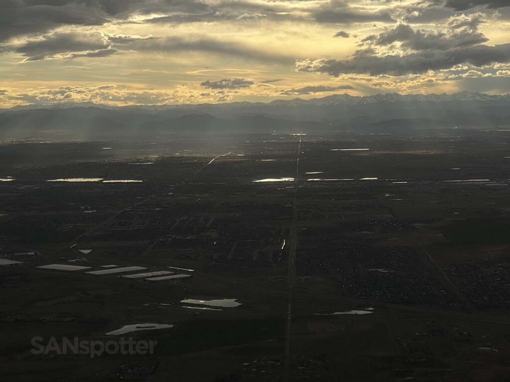 View of the Rocky Mountains while on approach into the Denver International Airport at sunset