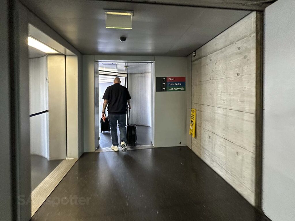 Walking into the jet bridge at gate E26 Zürich airport