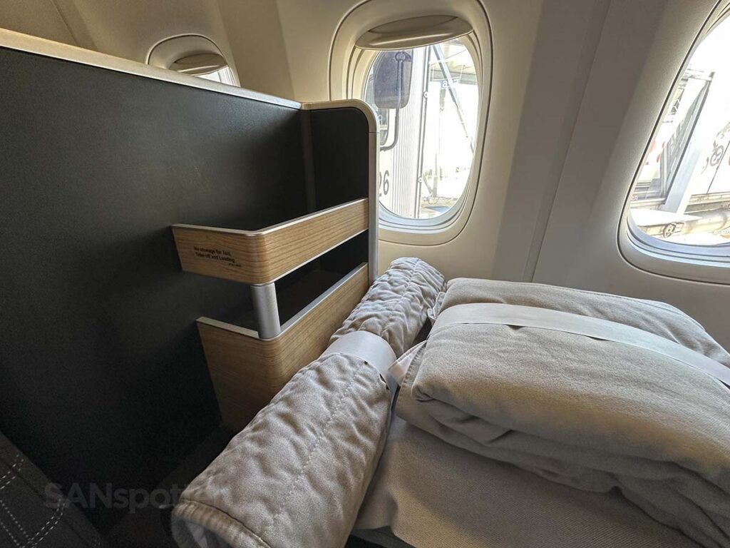 Swiss 777-300ER business class storage compartment and shelf