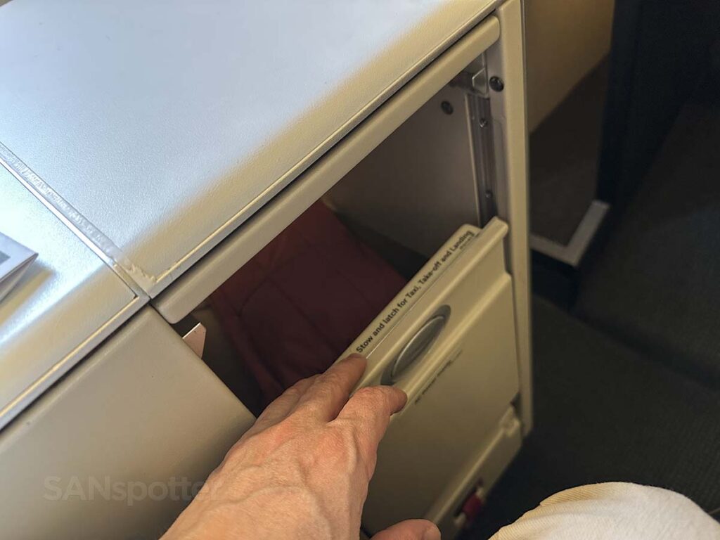 Swiss 777-300ER business class slide down door to the storage compartment