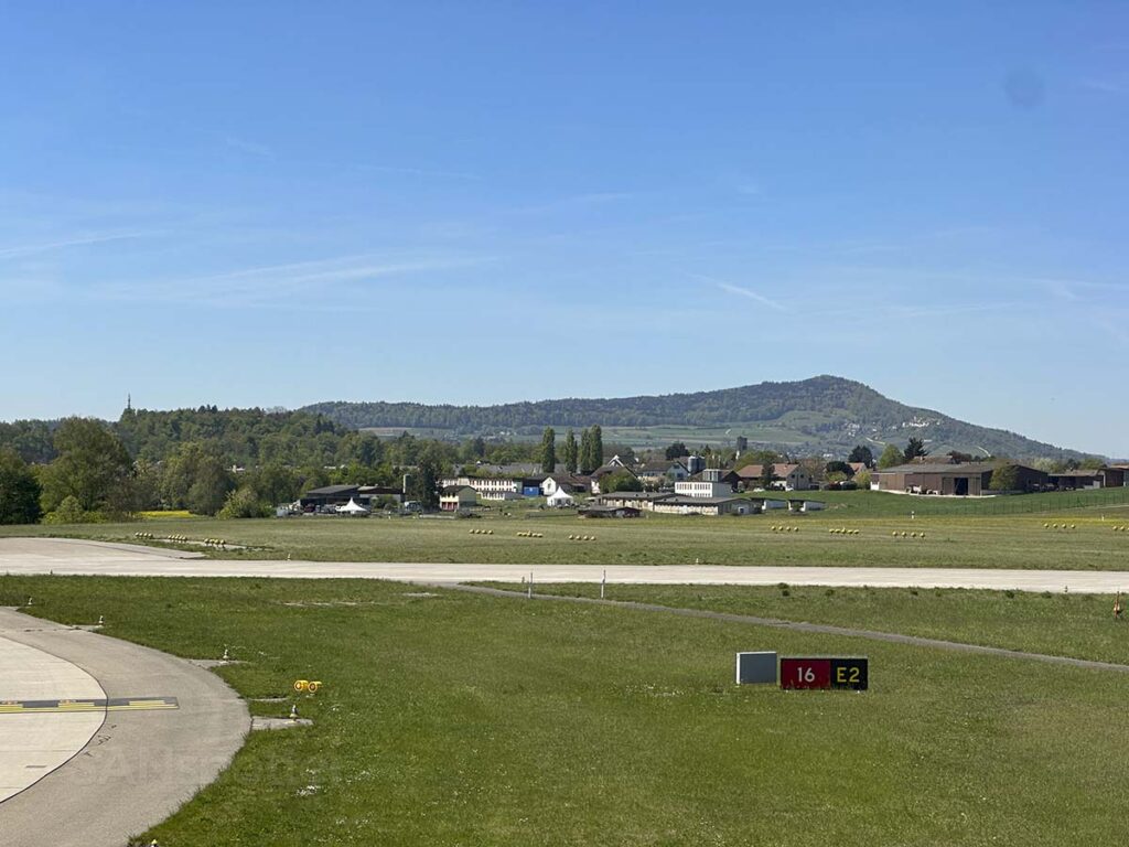 View of the scenery on a clear sunny day at ZRH while taxing out to the runway