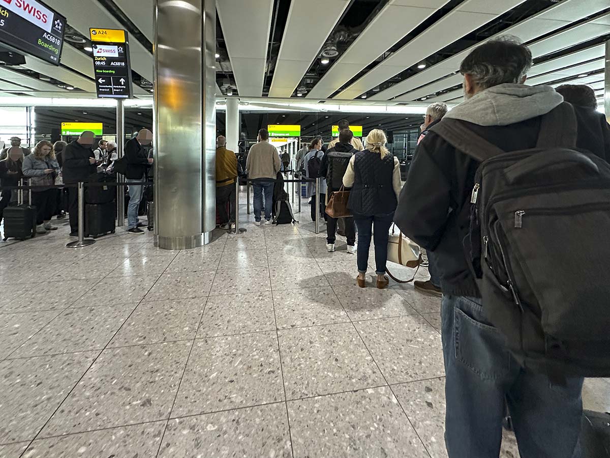 Swiss Airlines Group 1 business class passengers boarding at gate A24 terminal 2 Heathrow Airport