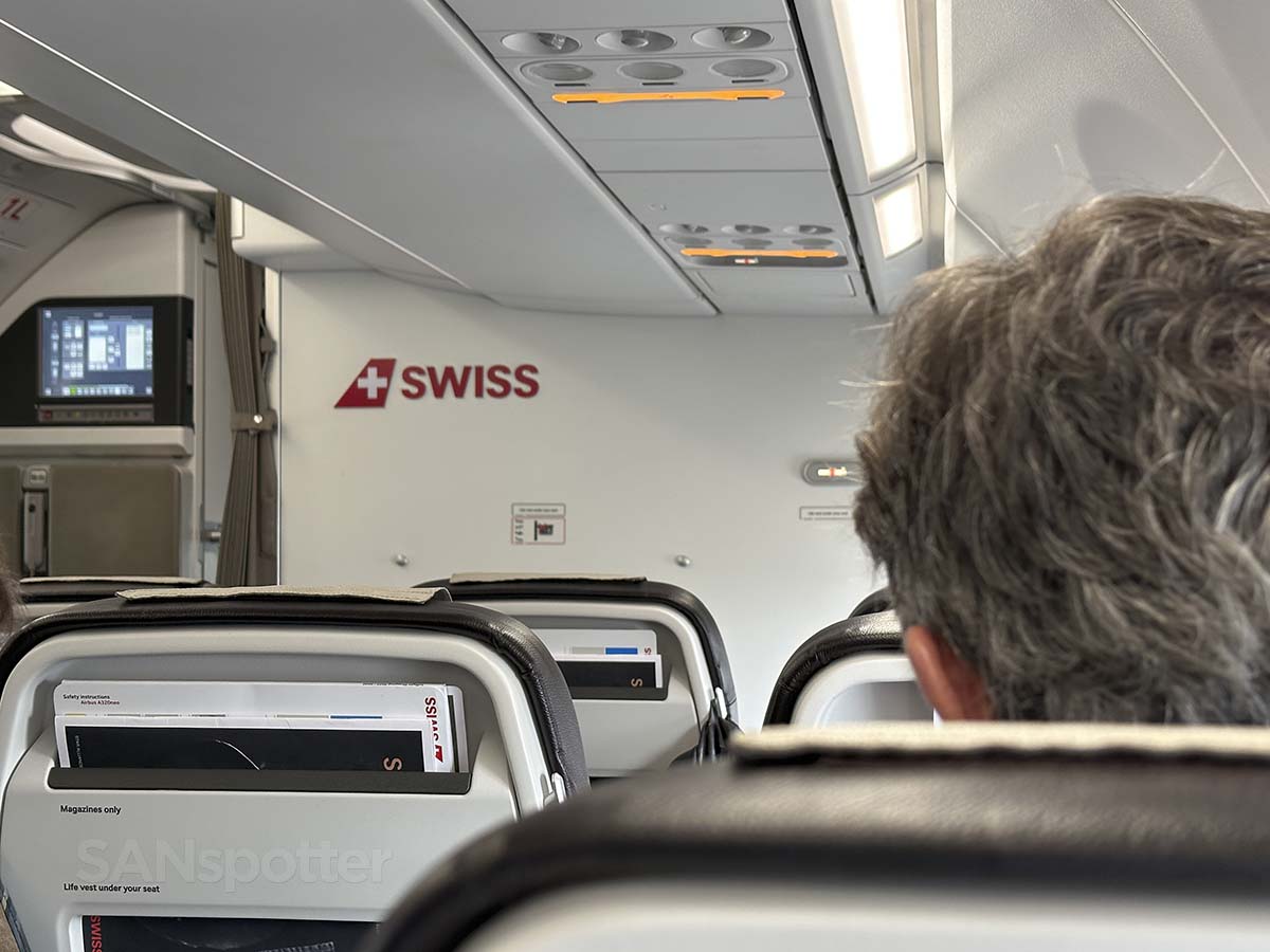 Swiss A320neo business class bulkhead wall with red SWISS logo
