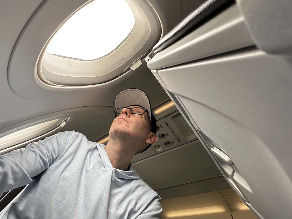 Scott (SANspotter) looking out the window from seat 3F in Swiss A320neo business class