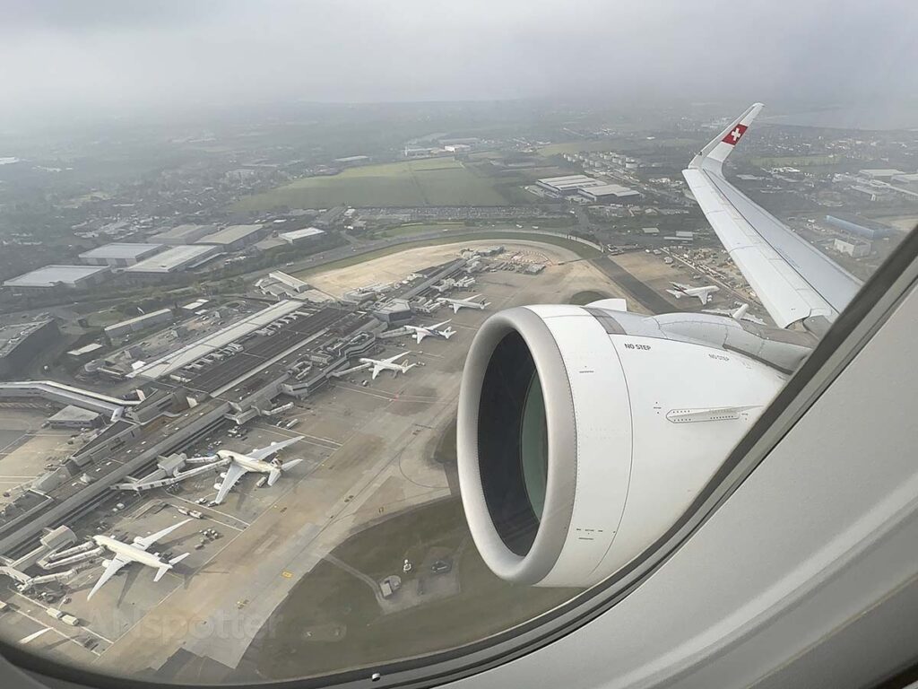 Looking down on Heathrow Airport moments after taking off from runway 09R in a Swiss A320neo