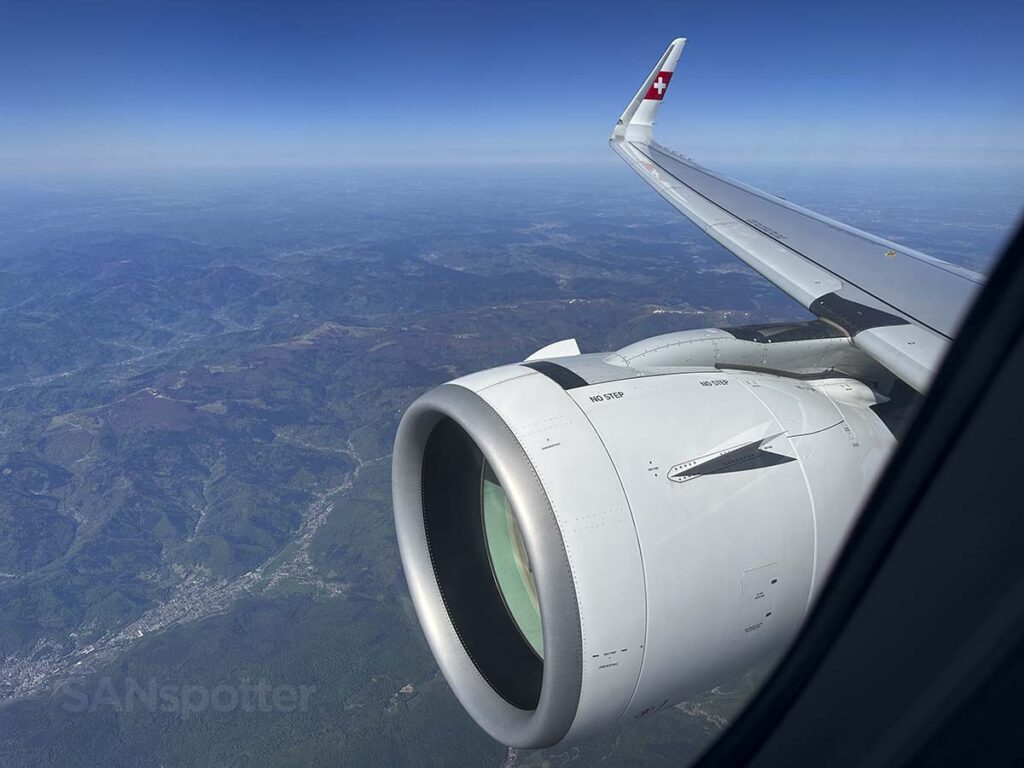 Looking out the window at the engine and wing while sitting in seat 3F Swiss A320neo business class