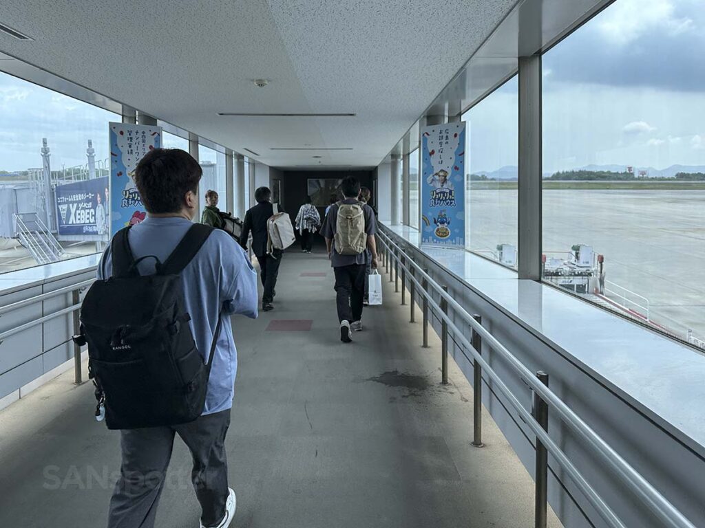 Walking into the jet bridge at gate B Hiroshima Airport