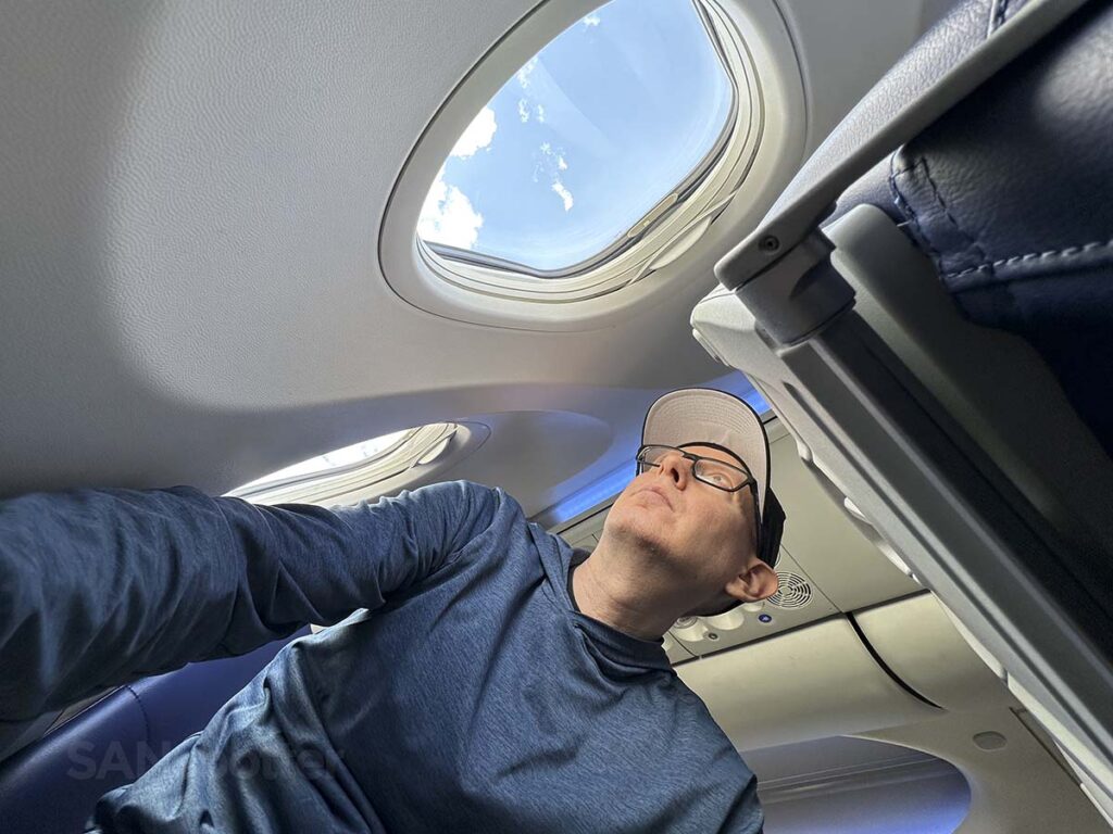 Scott (SANspotter) looking out the window of a Southwest Airlines 737 MAX 8 