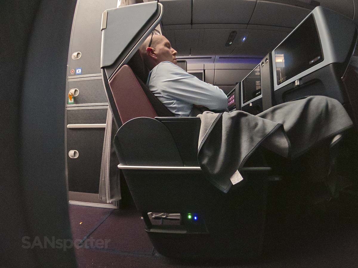 Scott Leazenby demonstrating the seat recline in JAL A350-1000 Premium Economy