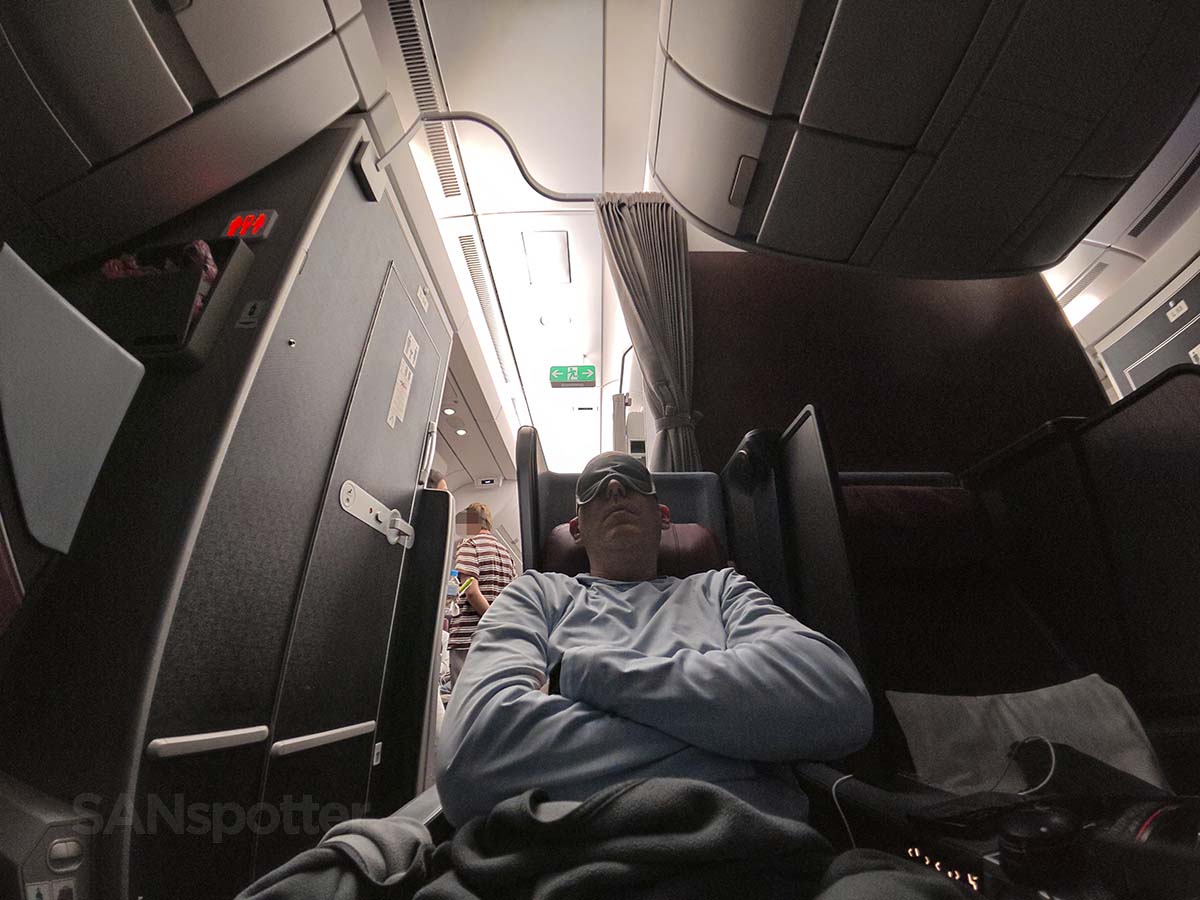 Scott Leazenby trying to sleep with an eye mask in JAL A350-1000 Premium Economy