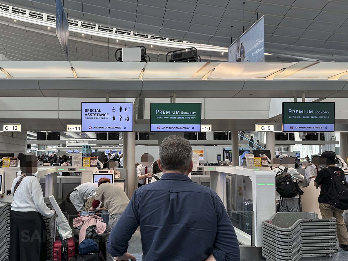 Waiting to check in for JAL premium economy terminal 3 Haneda airport