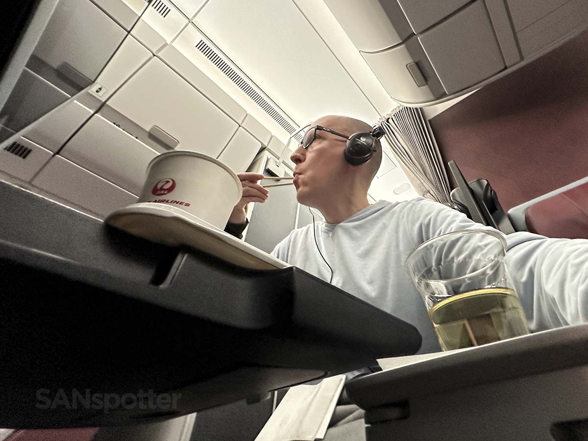 Scott Leazenby eating dinner in JAL A350-1000 Premium Economy