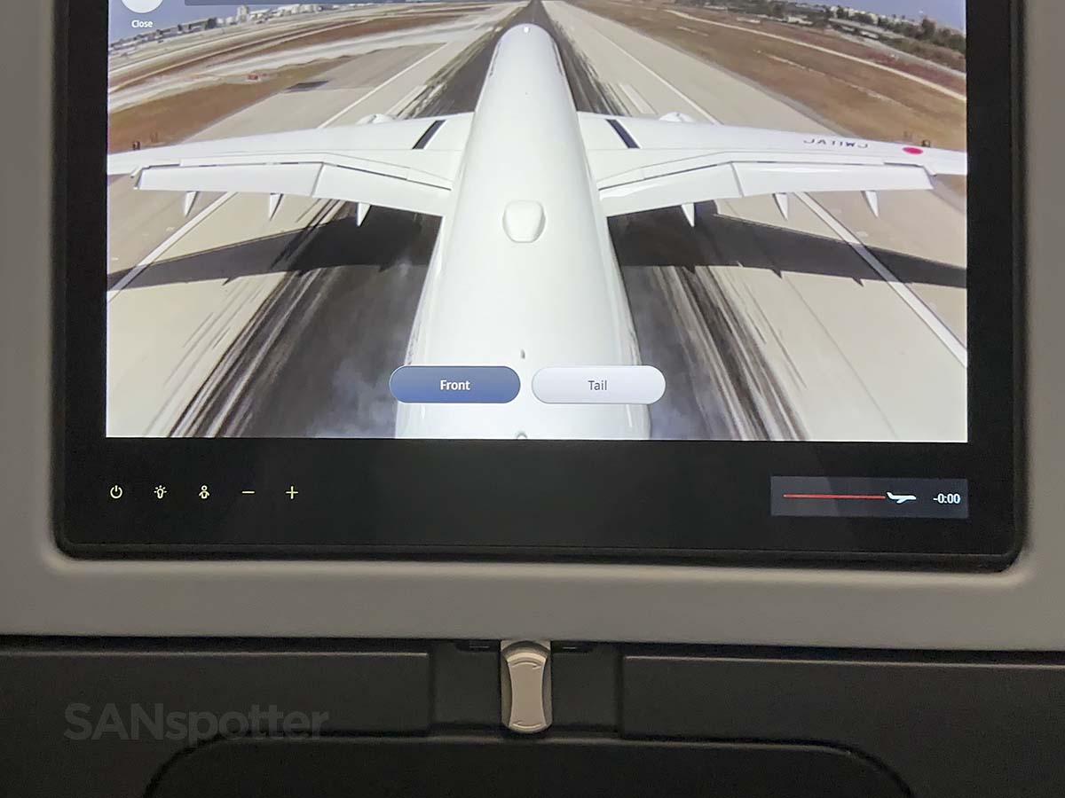 JAL A350-1000 touching down on runway 24R at LAX, as seen from the tail camera on the video screen in the premium economy cabin