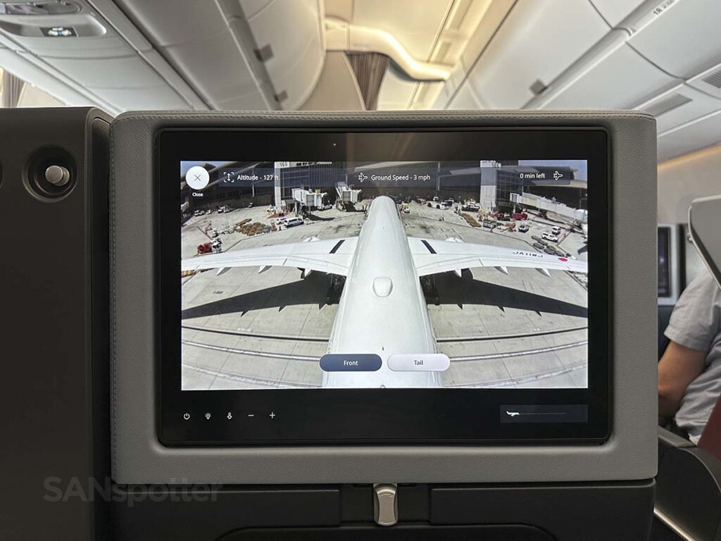 JAL A350-1000 pulling up to Terminal B gate 155 at LAX, as seen from the tail camera on the video screen in the premium economy cabin