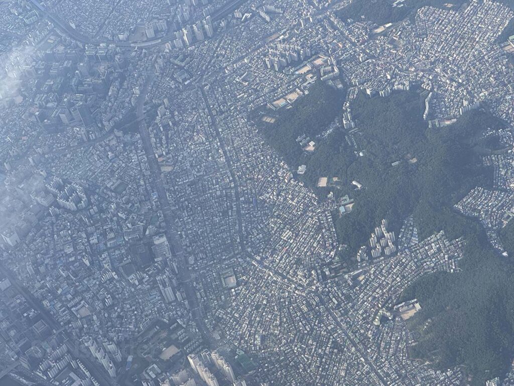 Flying directly over top of Seoul just moments after taking off from Incheon Airport