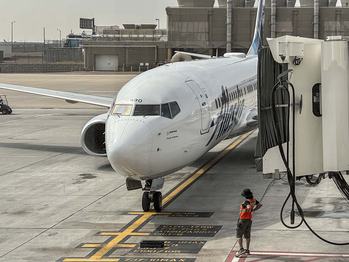 Alaska Airlines 737-800 pulling up to gate A44 Denver International Airport