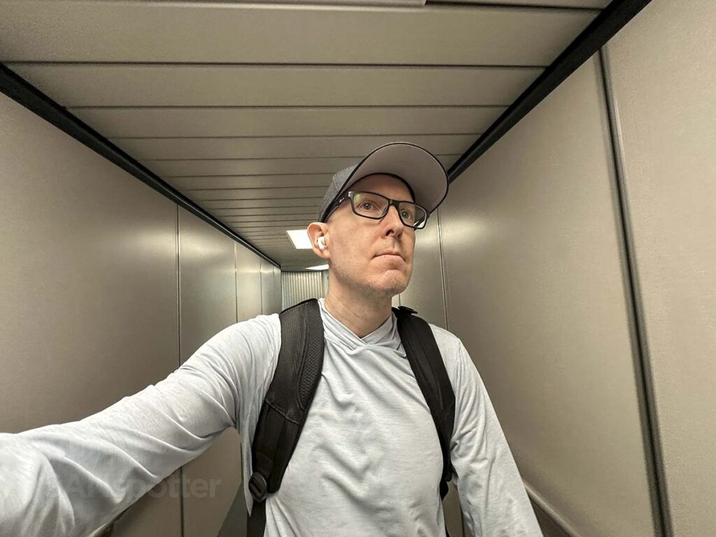 Scott Leazenby walking down gate A44 jet bridge Denver International Airport