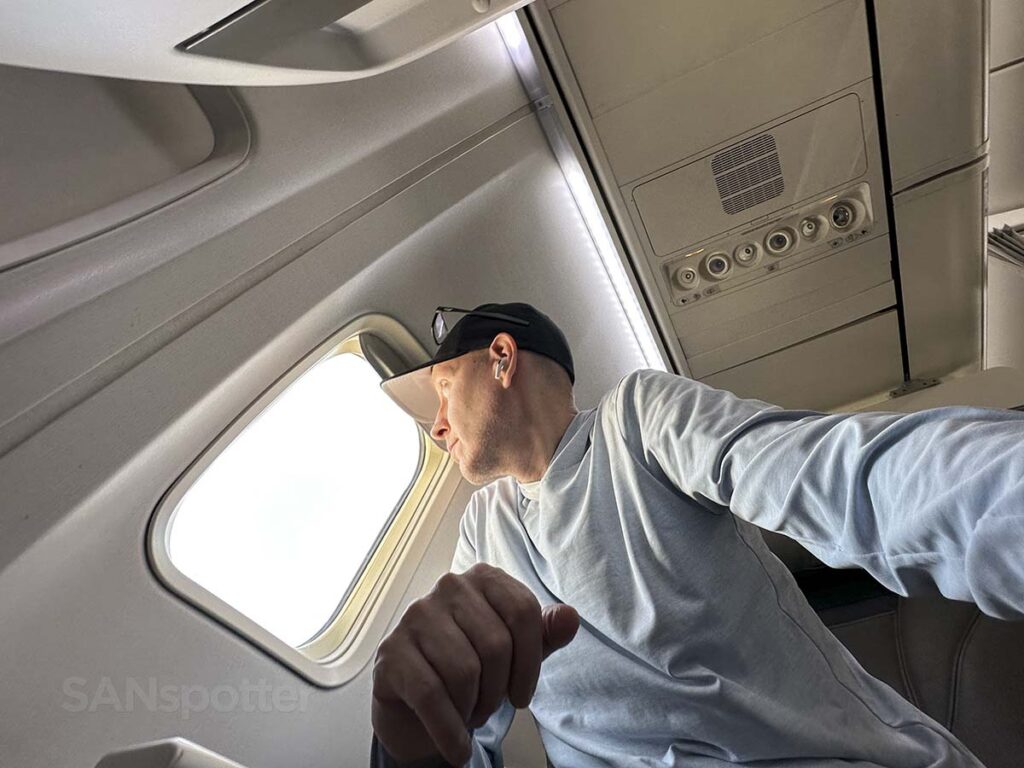 Scott Leazenby looking out the window of seat 4F Alaska Airlines 737-800 first class