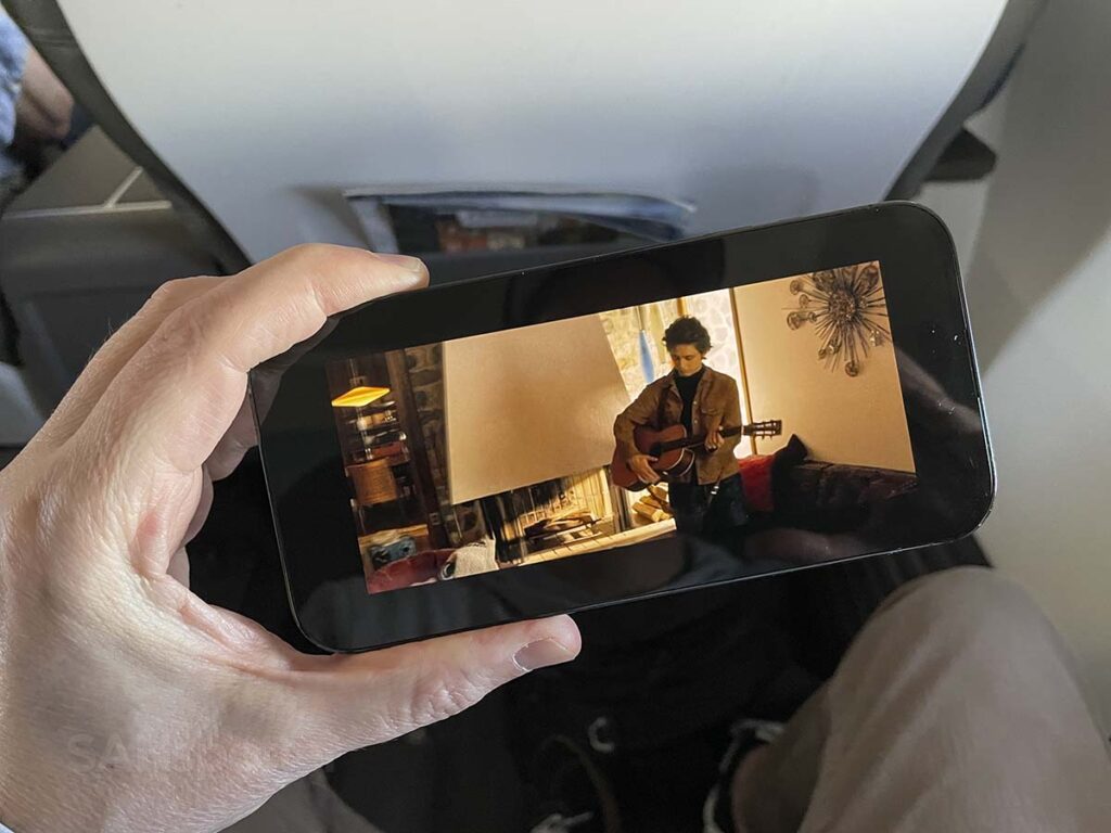 Watching a movie on my personal device with the free in-flight entertainment in Alaska Airlines 737-800 first class