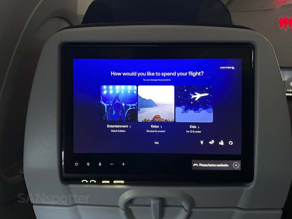 United A321neo Economy Plus in flight entertainment screen which asks how you would like to spend your flight (whether it's watching movies, relaxing, or watching kids content)