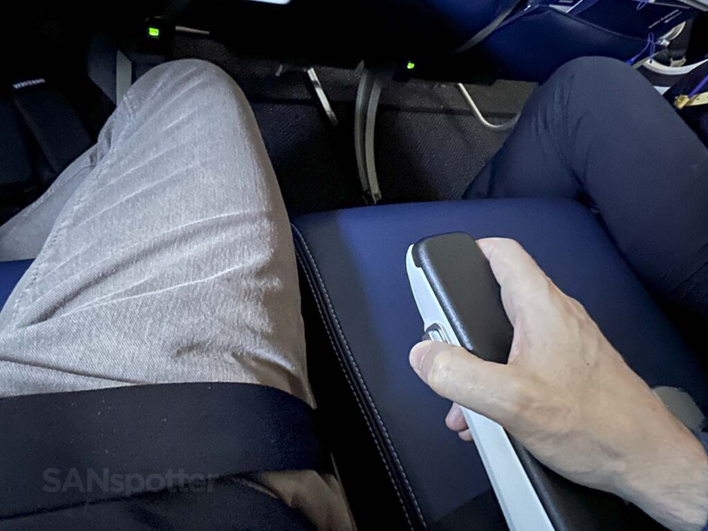 The seat recline button in the armrest United A321neo Economy Plus 