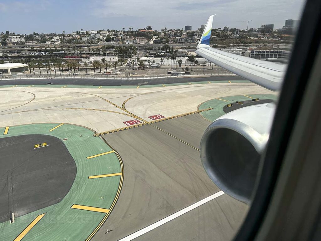 Looking out the window of an Alaska Airlines 737-800 while on short final for runway 27 at SAN