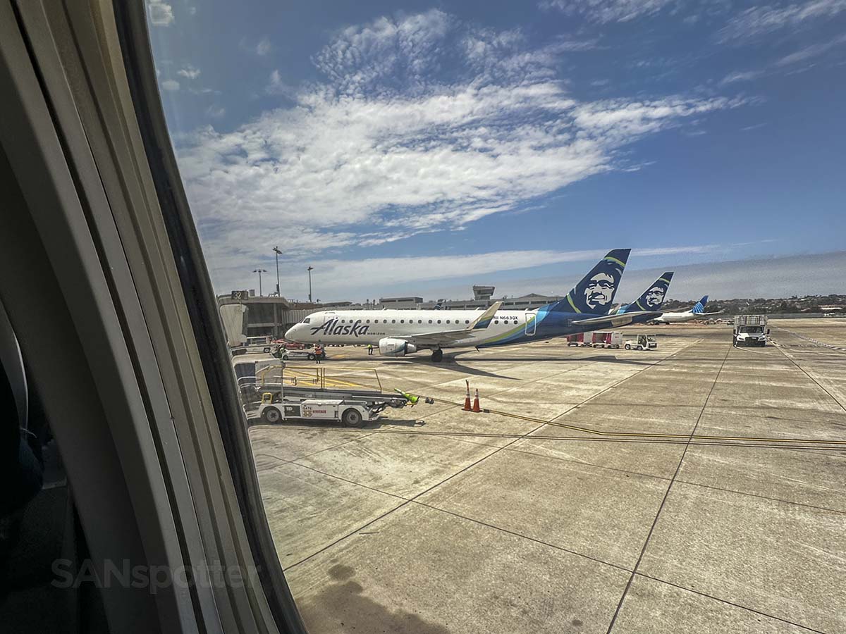 Looking out the window of an Alaska Airlines 737-800 while pulling up to terminal 2 East at the San Diego International Airport