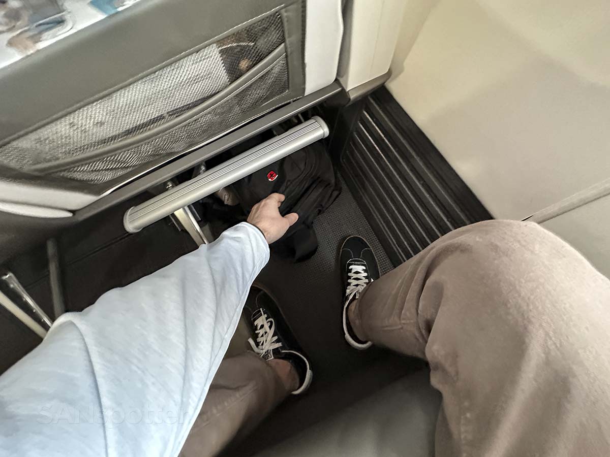 Retrieving my backpack from under the seat in front of me at the end of the flight in Alaska Airlines 737-800 first class