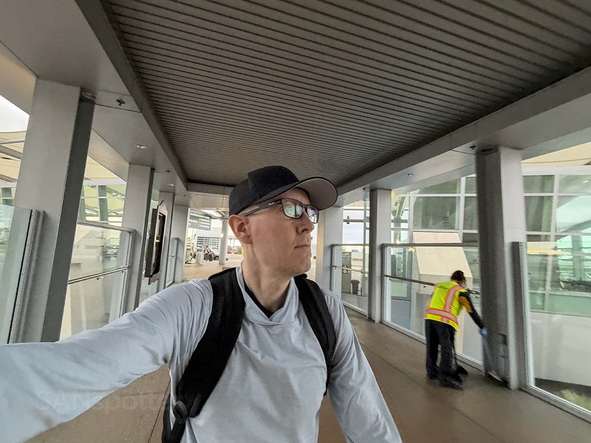Scott Leazenby walking into terminal 2 west at the San Diego International Airport