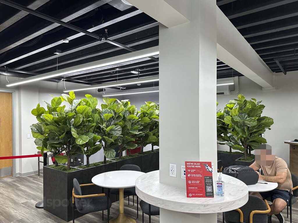 JSX lounge with tables and chairs in the Carlsbad Jet Center at the McClellan-Palomar Airport