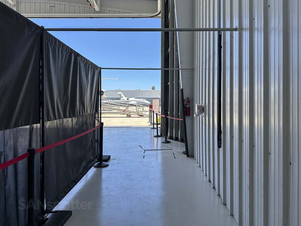 Walking through the hanger on my way out to the plane at the Carlsbad Jet Center at the McClellan-Palomar Airport
