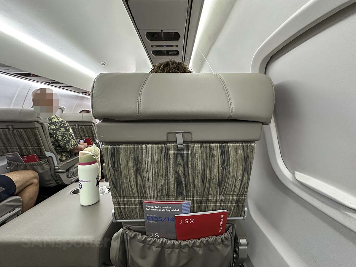 JSX Embraer 145 seatbacks with headrests and woodgrain tray tables