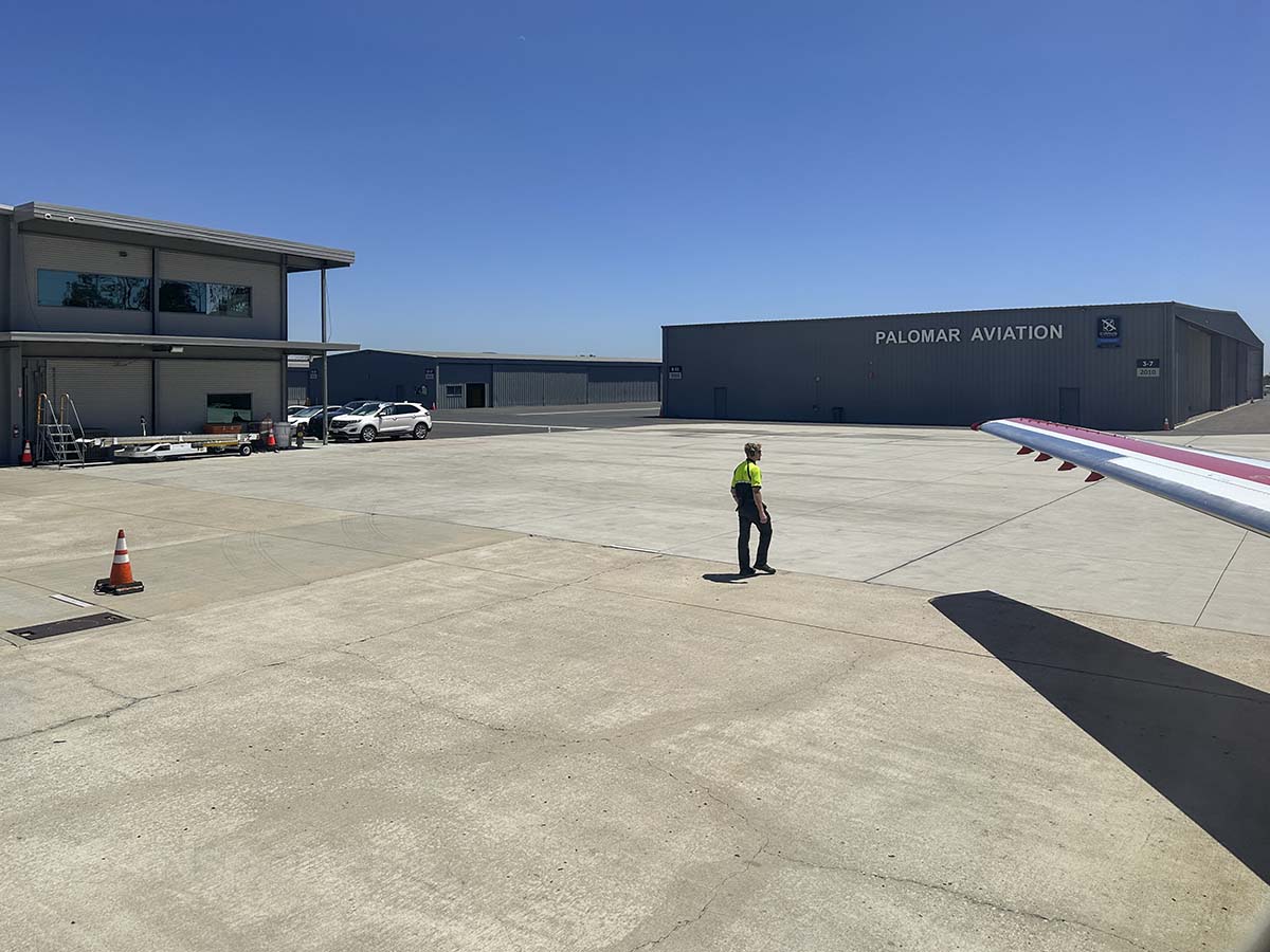 JSX ramp worker at the Carlsbad Jet Center at the McClellan-Palomar Airport
