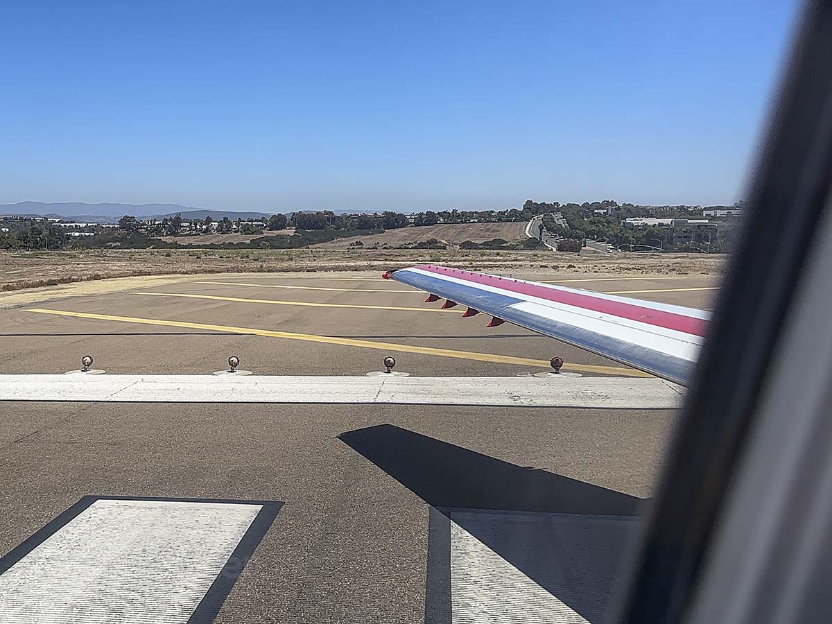 JSX E145 turning onto runway 24 at the McClellan-Palomar Airport