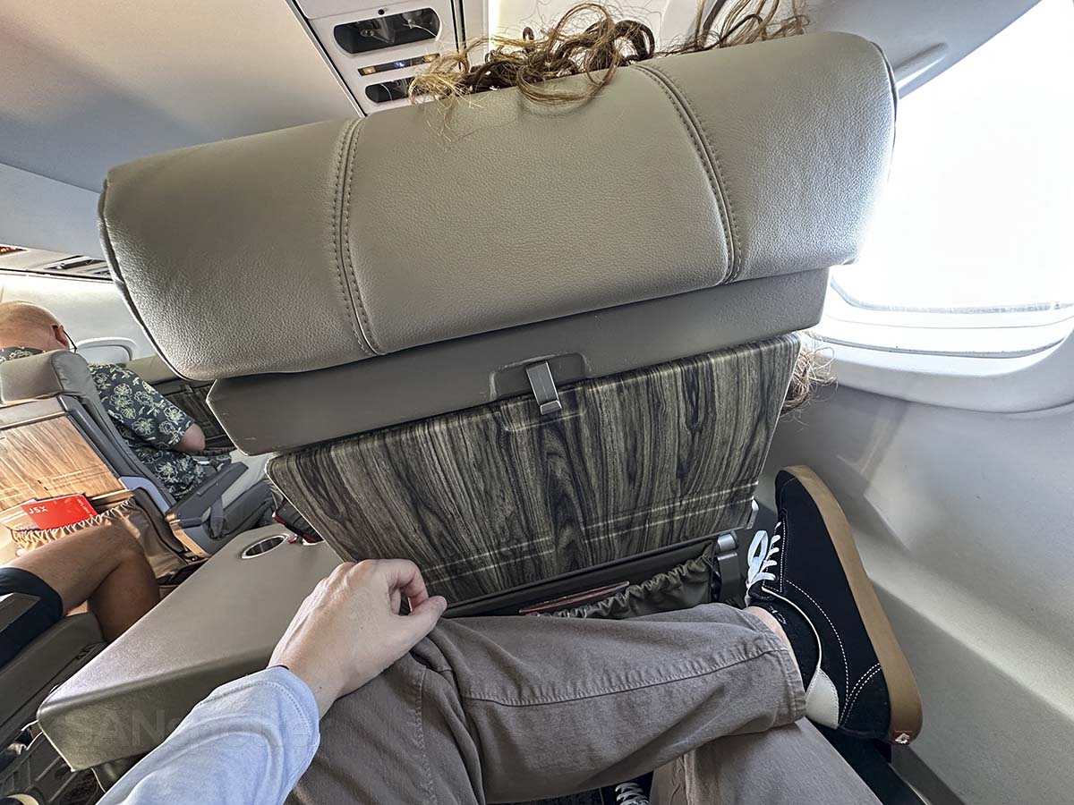 Crossing my legs in seat 5C on the JSX E145 while the passenger in front of me is fully reclined
