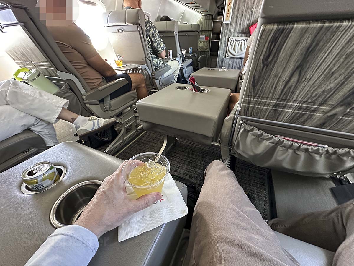Enjoying a beverage in the JSX E145