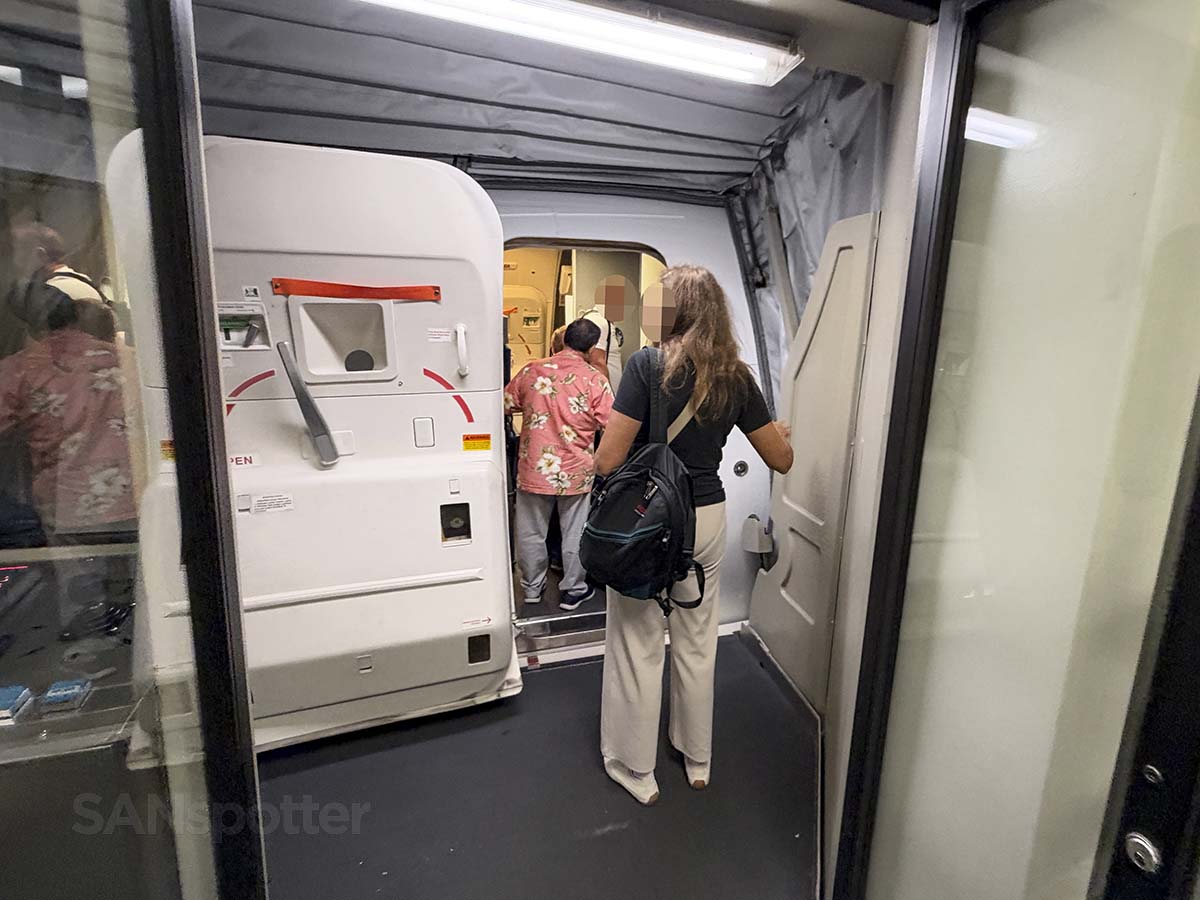 Passengers entering the forward boarding door on a United Airlines 757-300
