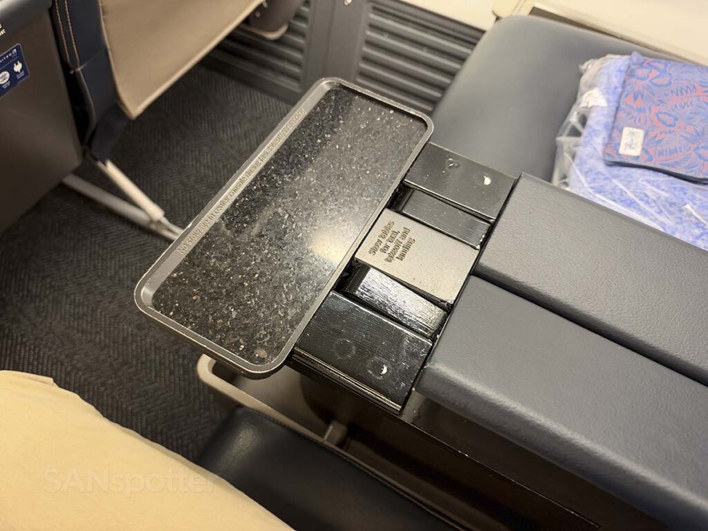 United Airlines 757-300 first class center console with armrest and drink tray