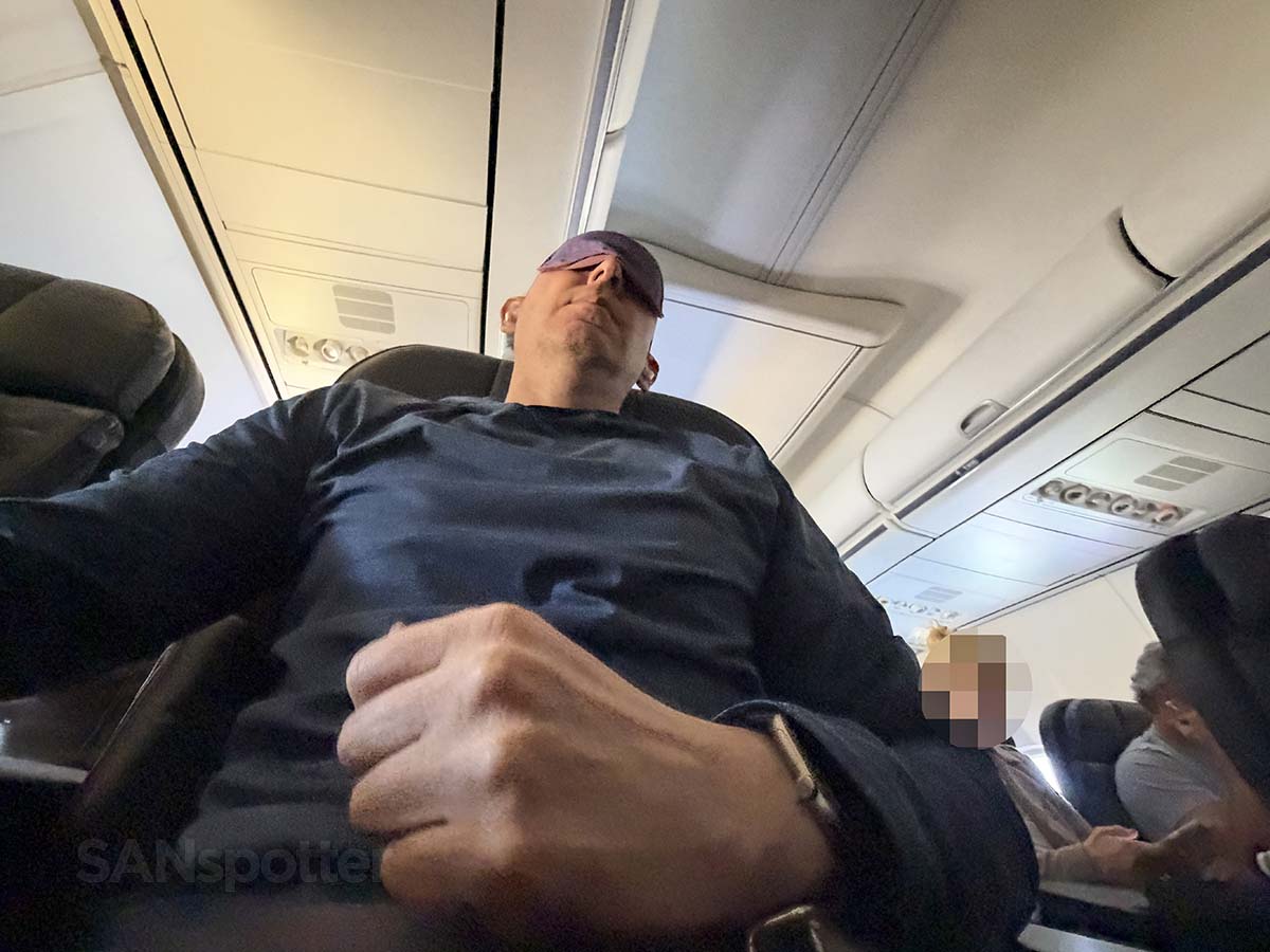 Scott Leazenby wearing an eye mask while sleeping in United Airlines 757-300 first class