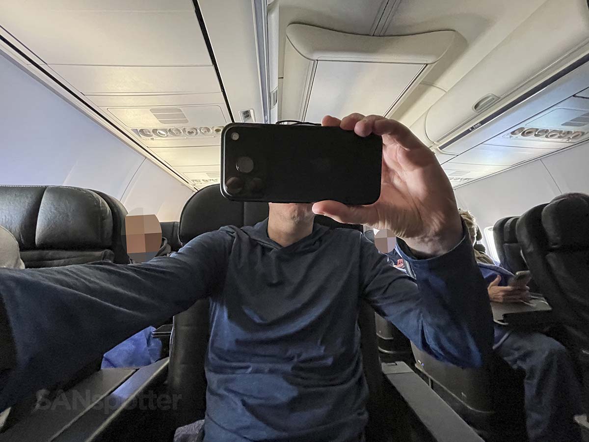Watching a movie on my iPhone in United Airlines 757-300 first class