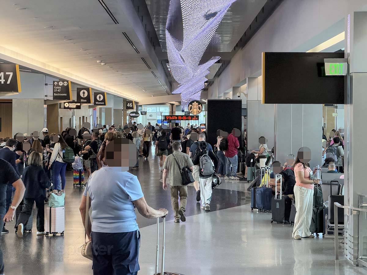 Crowded terminal 2 West at the San Diego airport midday on a Saturday