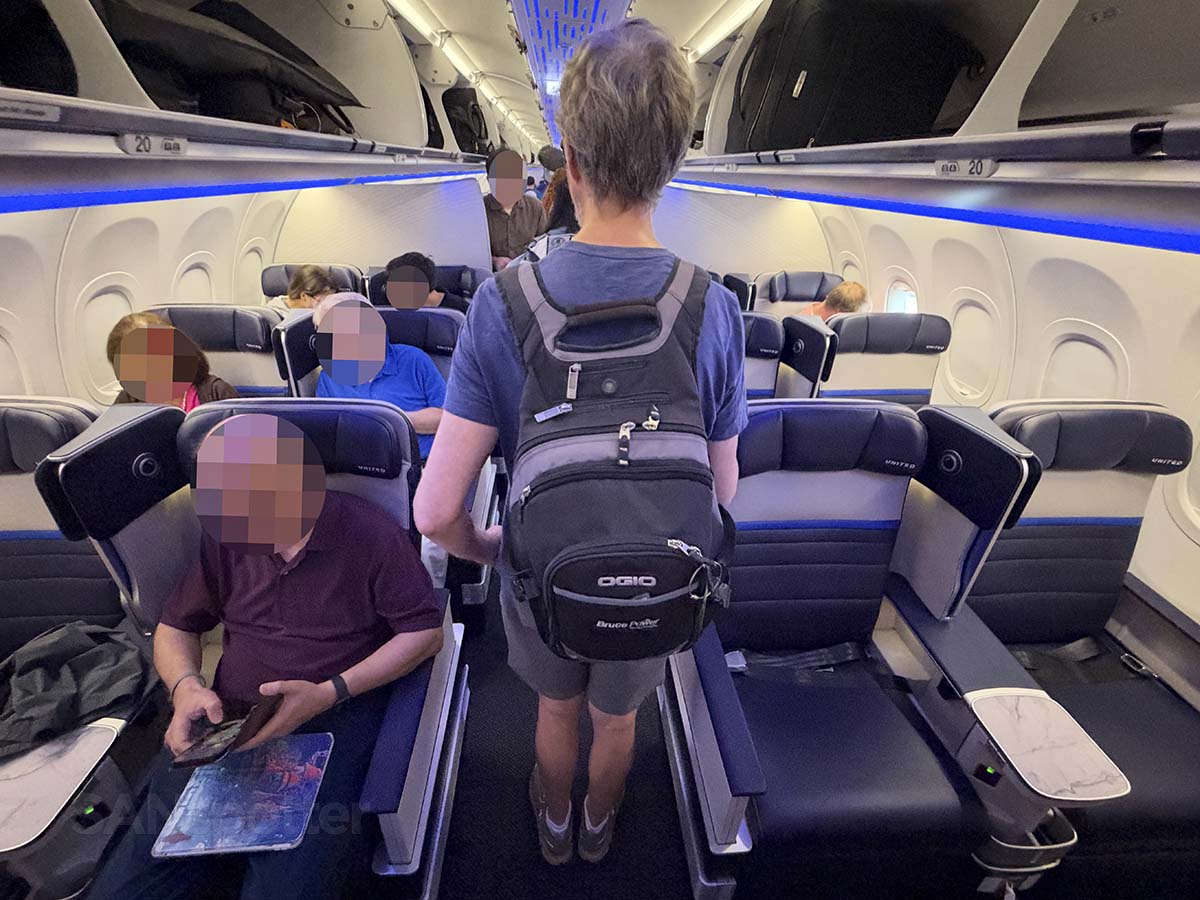 Walking through the United Airlines A321XLR premium economy cabin on my way back to economy