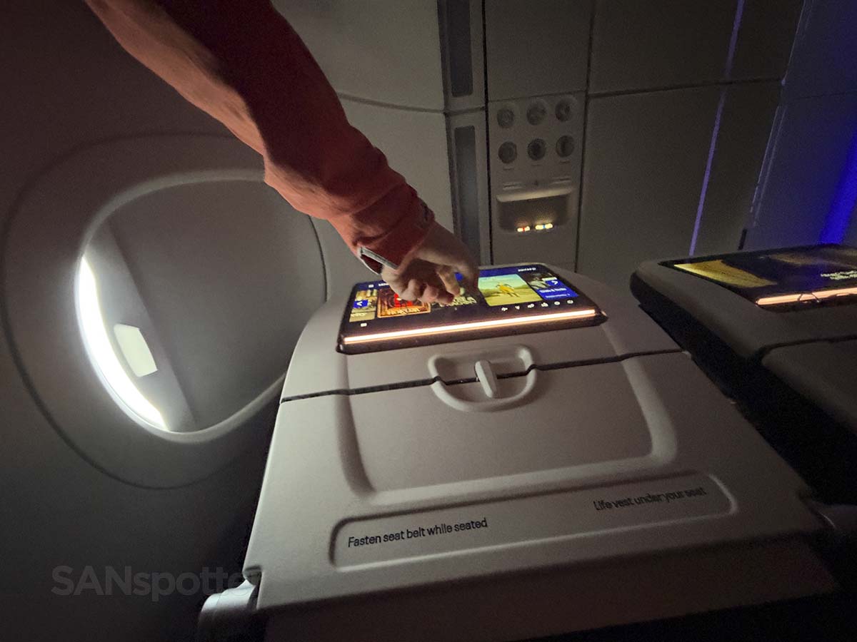 Glowing light bar underneath the video screen in United Airlines A321XLR economy