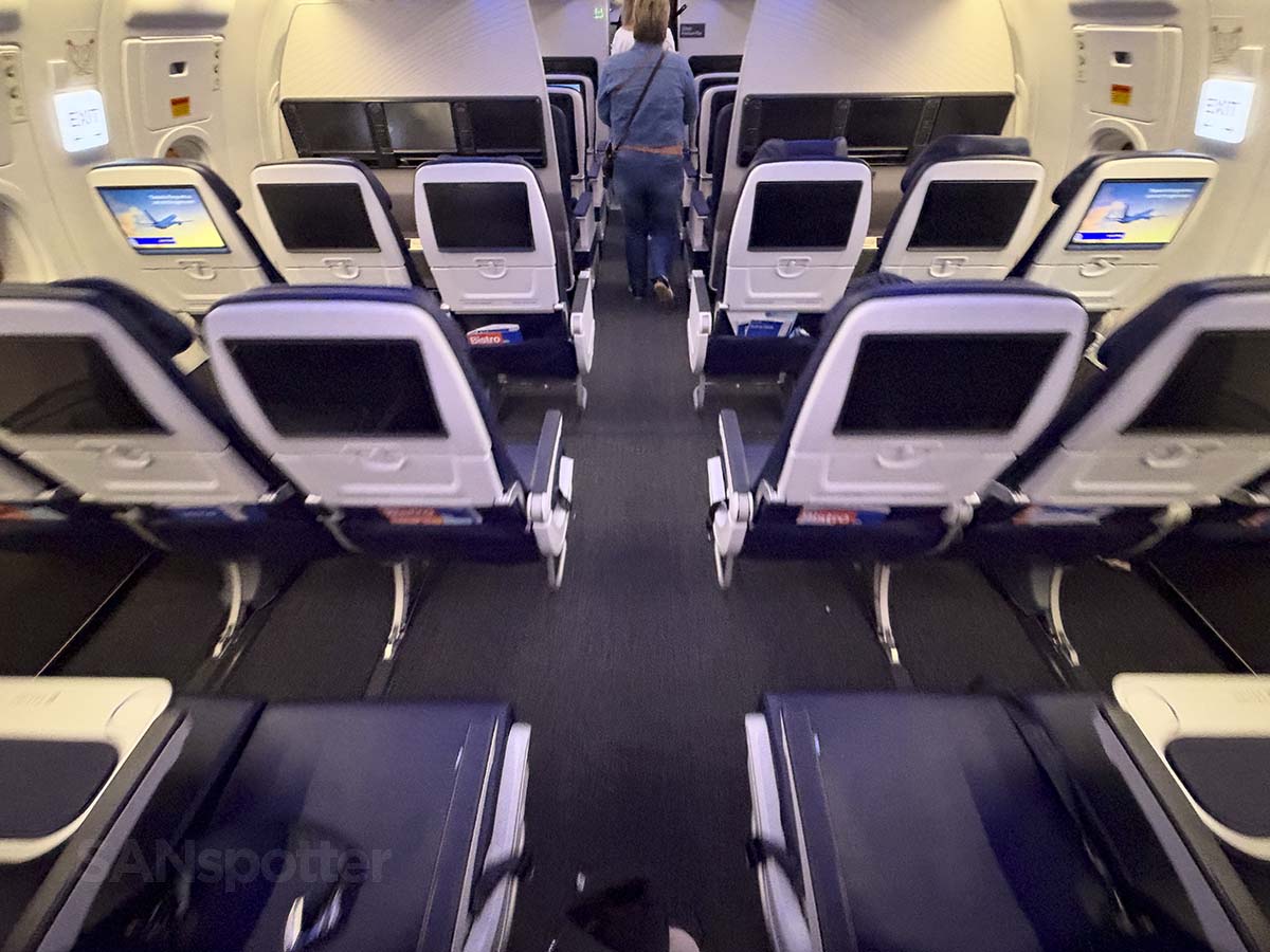 Walking up the aisle of United Airlines A321XLR economy upon deplaning at IAD